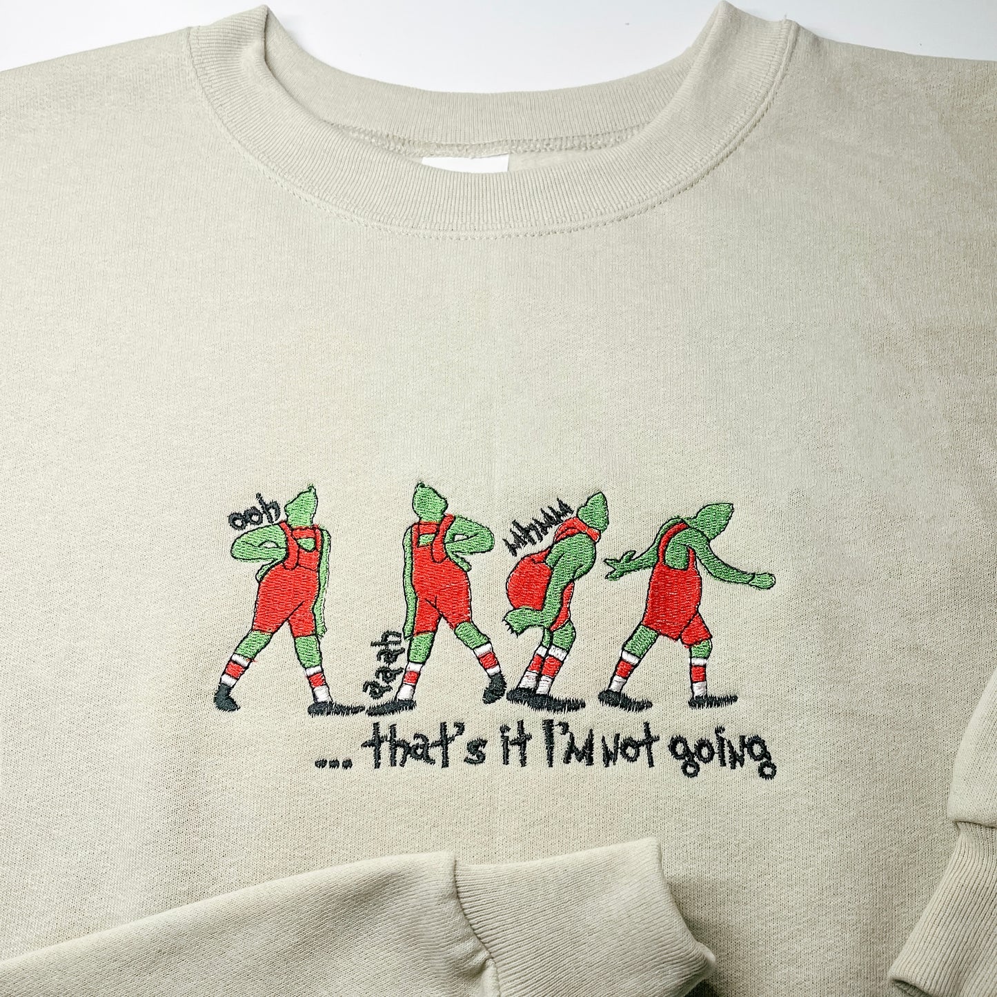 Green Sly Christmas Guy in Red Crewneck