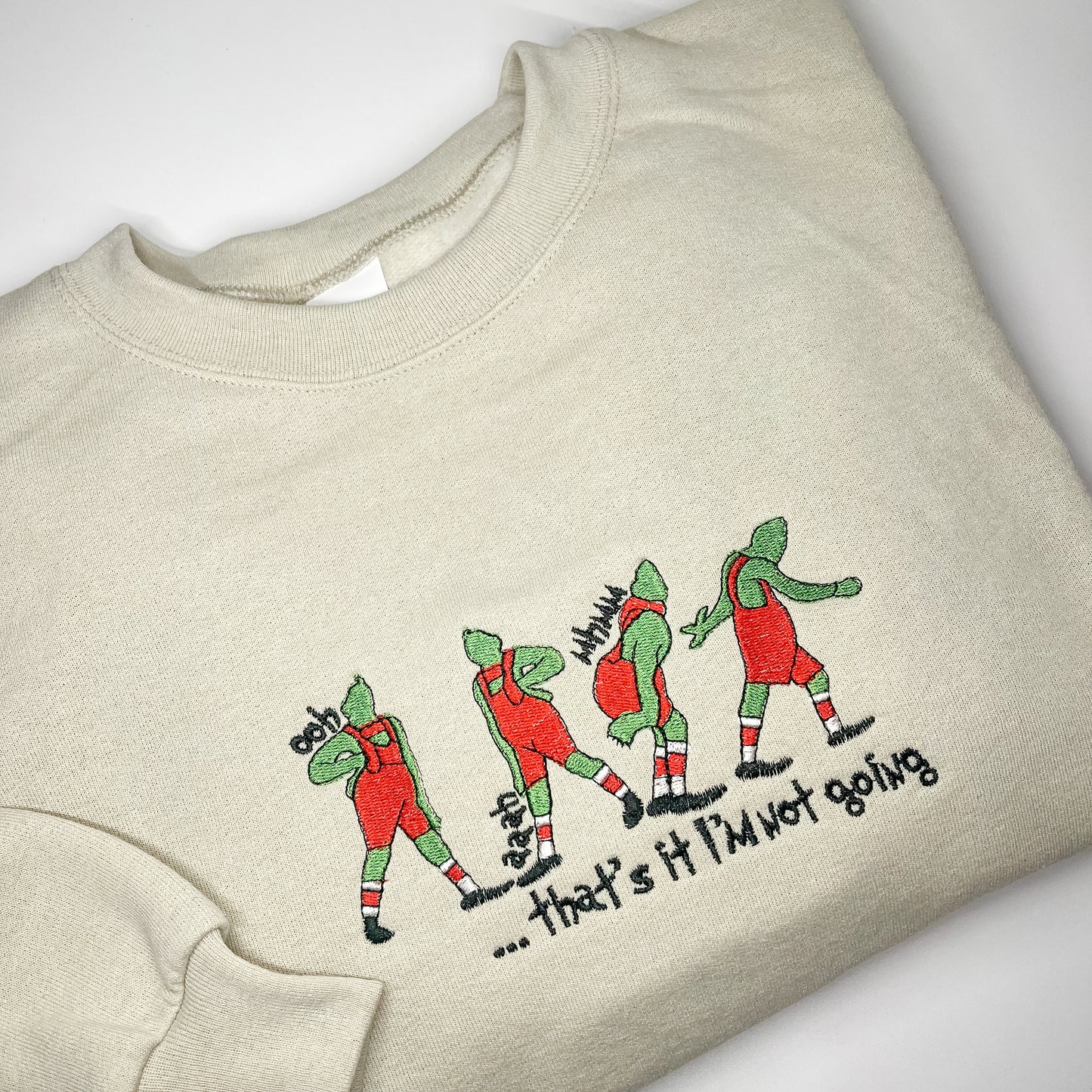 Green Sly Christmas Guy in Red Crewneck